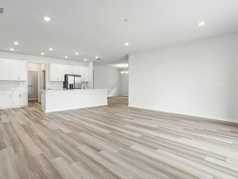 Inside, enjoy a sunny, open living area with LVP flooring. Inside, enjoy a sunny, open living area with LVP flooring.