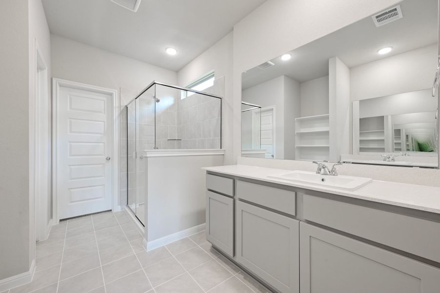 Primary Bath in the Willow home plan by Trophy Signature Homes – REPRESENTATIVE PHOTO