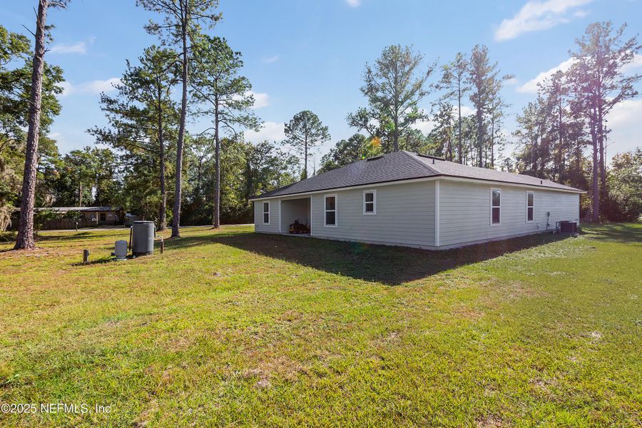 Exterior details and patio area of a home in , Satsuma (Image 23). Exterior details and patio area of a home in , Satsuma (Image 23).