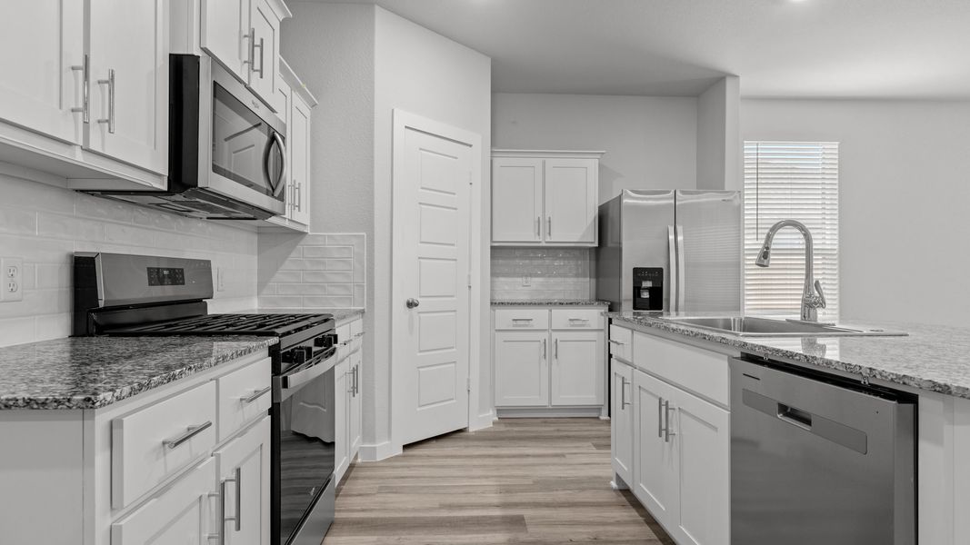 Representative furnished interior of a home built from the LAKE FORT by D.R. Horton in Heritage Parks, Abilene (Image 8).