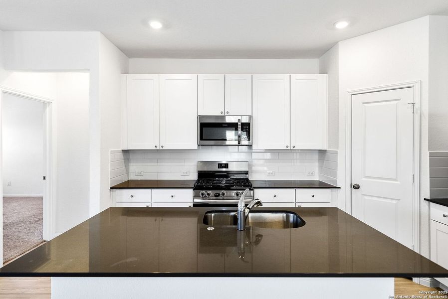 Furnished interior view inside a new home in , Bulverde (Image 7).