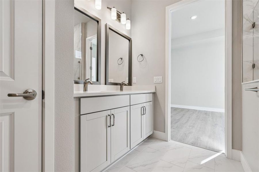 Furnished interior view inside a new home in Emerald Landing at Waterside at Lakewood Ranch – Cottage Series, Sarasota (Image 7). Furnished interior view inside a new home in Emerald Landing at Waterside at Lakewood Ranch – Cottage Series, Sarasota (Image 7).