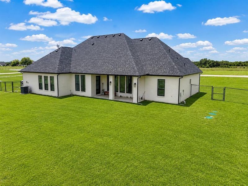 Exterior details and patio area of a home in , Whitesboro (Image 4).