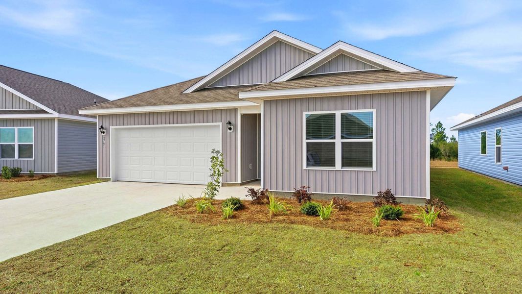 Front exterior of a new home in Liberty, Panama City, FL, highlighting curb appeal (Image 18).