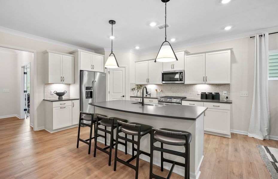 Furnished interior view inside a new home in Stewarts Landing, Charlotte (Image 17).
