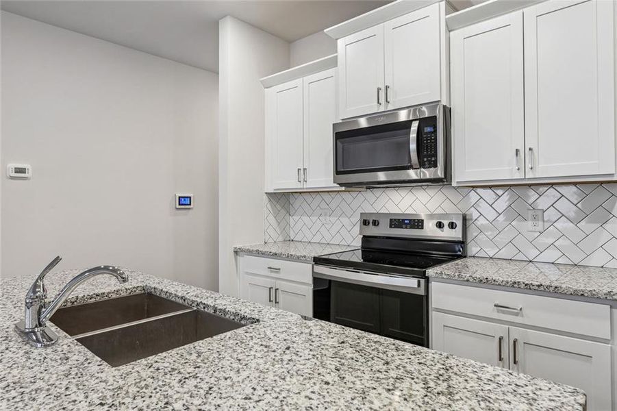 Furnished interior view inside a new home in , Decatur (Image 5).