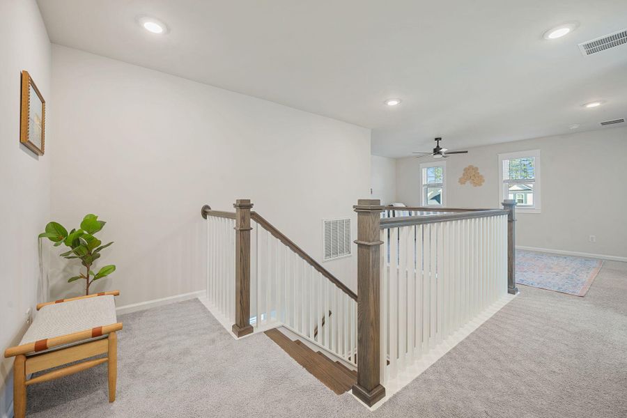 Furnished interior view inside a new home in Jasmine Point at Lakes of Cane Bay, Summerville (Image 17).