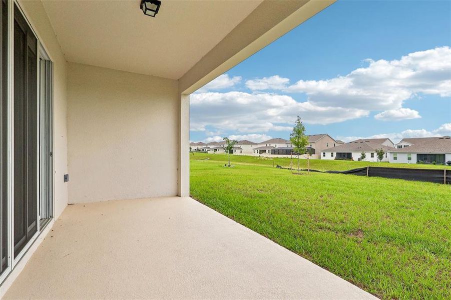 Exterior details and patio area of a home in Park View at the Hills, Minneola (Image 3).