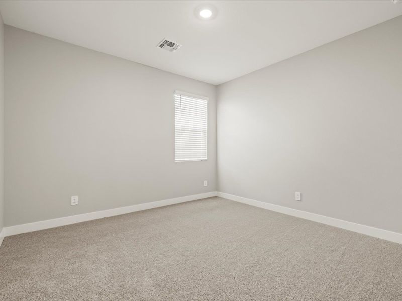 Spacious, unfurnished interior of a new home in White Tank Foothills Signature Series, Waddell (Image 12).