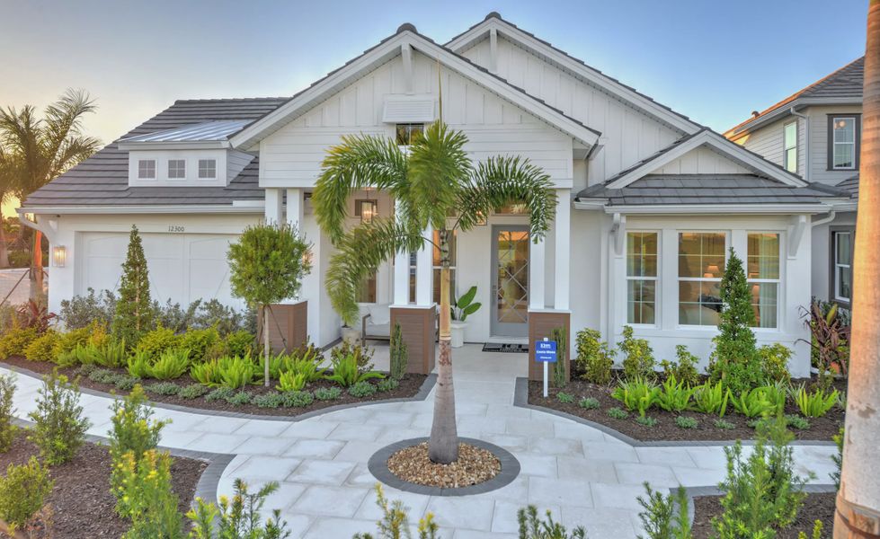 Front exterior of a new home in Wellen Park, Venice, FL, highlighting curb appeal (Image 2). Front exterior of a new home in Wellen Park, Venice, FL, highlighting curb appeal (Image 2).