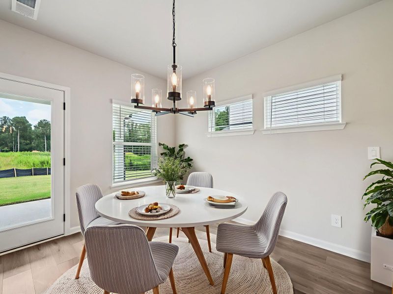 Furnished interior view inside a new home in Vines at Mill Creek - Estate Series, Braselton (Image 3).