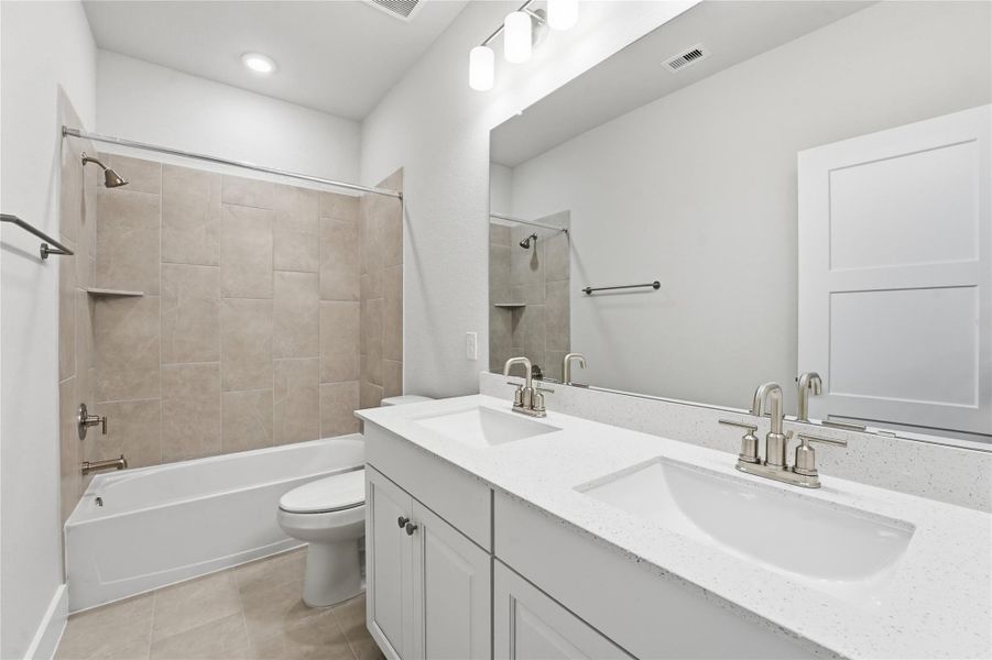 Furnished interior view inside a new home in Bridgeland, Cypress (Image 4).