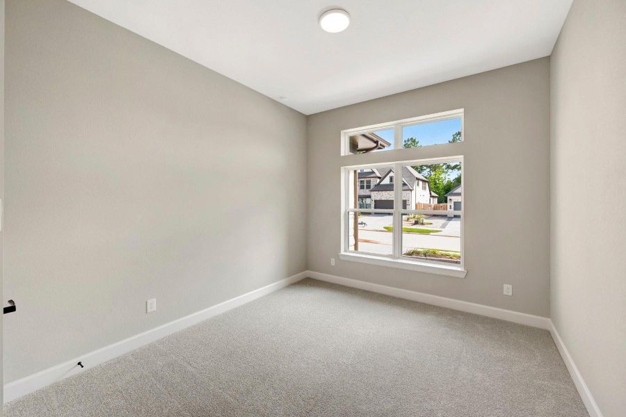 Spacious ensuite bedroom with big windows!