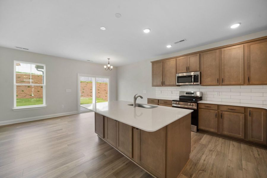 Furnished interior view inside a new home in Cottages at Piper Village, Trinity (Image 5).