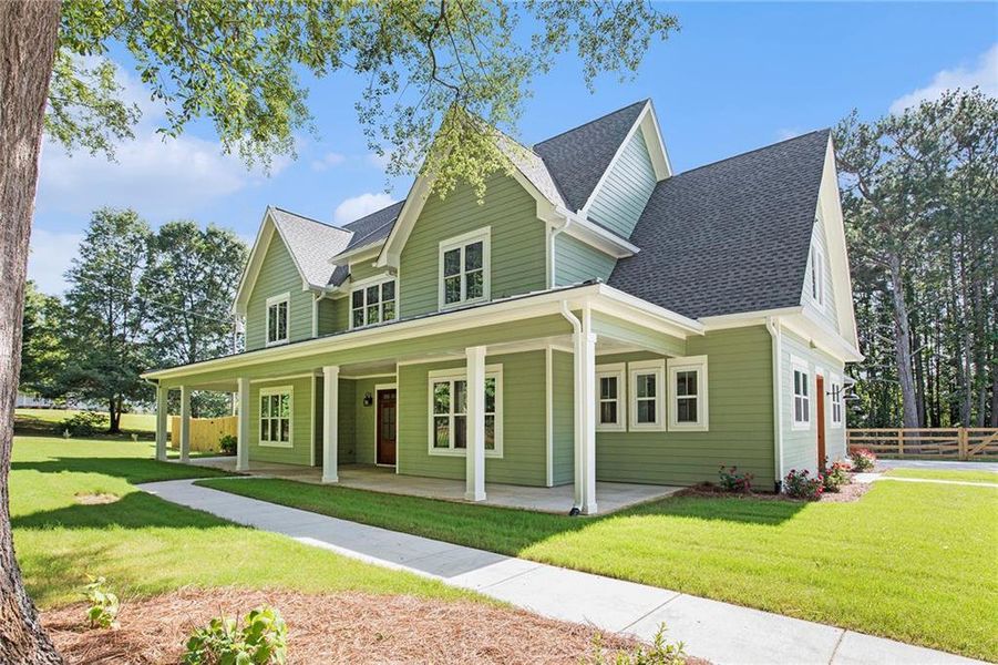 Front exterior of a new home in , Canton, GA, highlighting curb appeal (Image 2). Front exterior of a new home in , Canton, GA, highlighting curb appeal (Image 2).