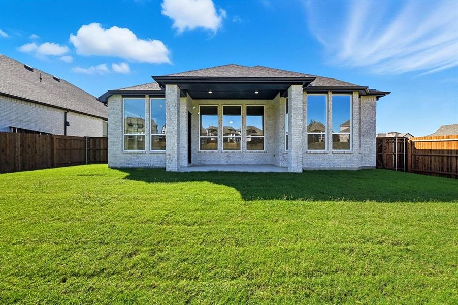 Exterior details and patio area of a home in Devonshire, Forney (Image 2). Exterior details and patio area of a home in Devonshire, Forney (Image 2).