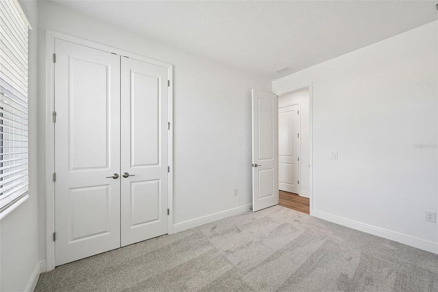 Spacious, unfurnished interior of a new home in Grand Park, Sarasota (Image 34).