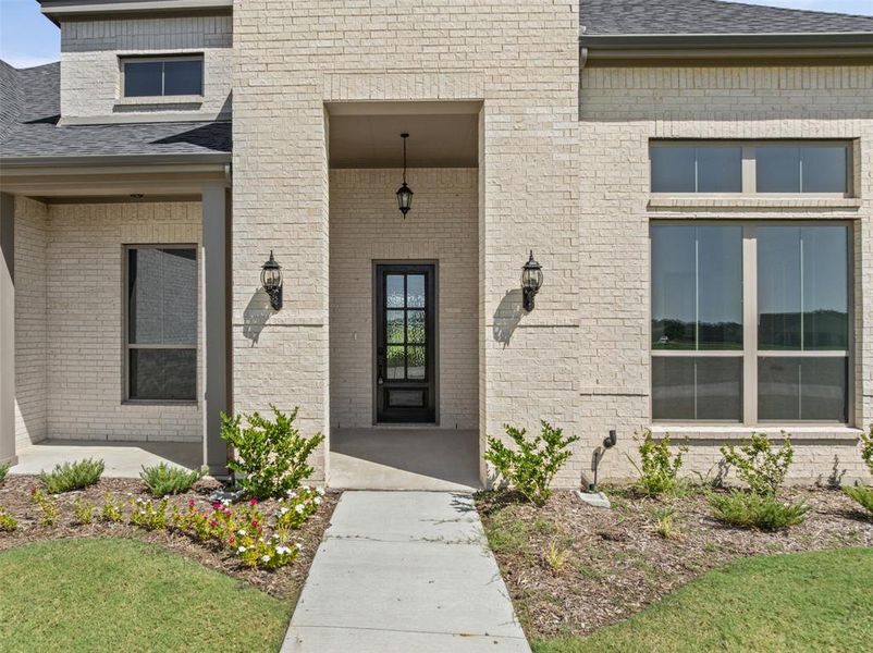 Exterior details and patio area of a home in Waterfall Ranch - 1 Acre Lots, Waxahachie (Image 26). Exterior details and patio area of a home in Waterfall Ranch - 1 Acre Lots, Waxahachie (Image 26).