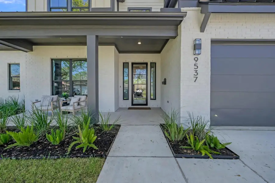 Exterior details and patio area of a home in , Houston (Image 2). Exterior details and patio area of a home in , Houston (Image 2).