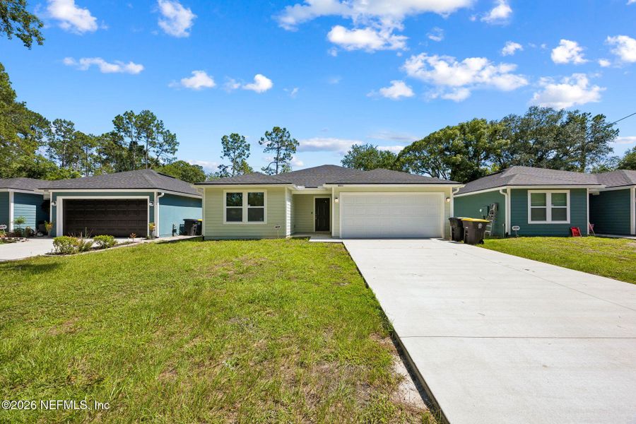 Front exterior of a new home in , Jacksonville, FL, highlighting curb appeal (Image 2). Front exterior of a new home in , Jacksonville, FL, highlighting curb appeal (Image 2).