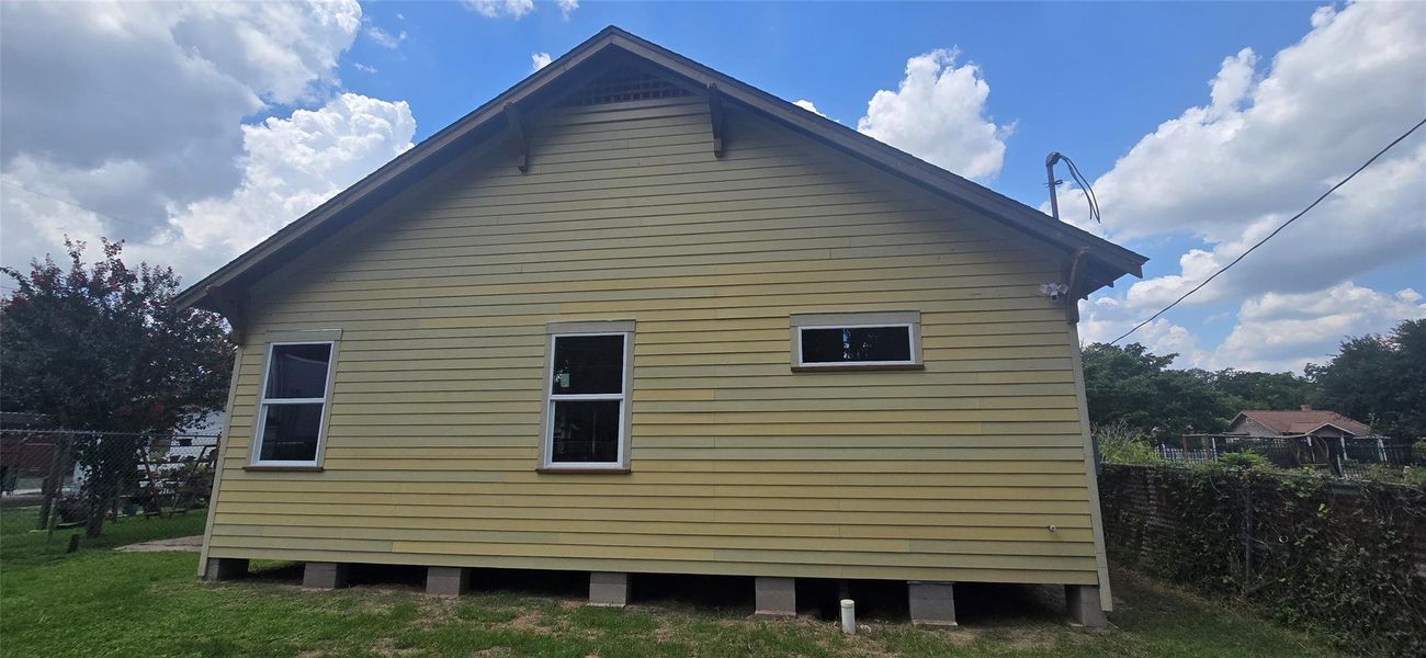 Exterior details and patio area of a home in , Houston (Image 5).