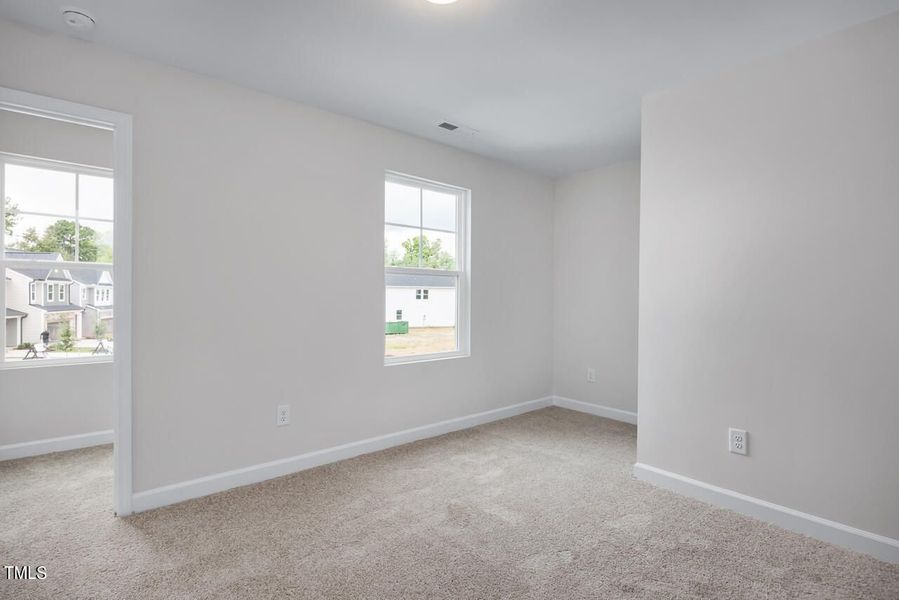 Spacious, unfurnished interior of a new home in Gregory Village, Lillington (Image 63).