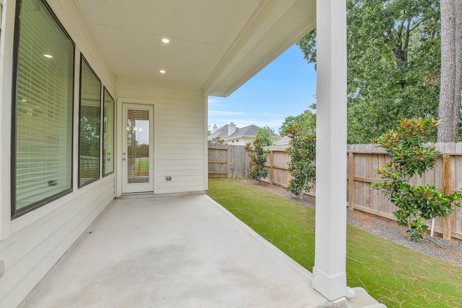 Exterior details and patio area of a home in Summer Place  35', Montgomery (Image 32).