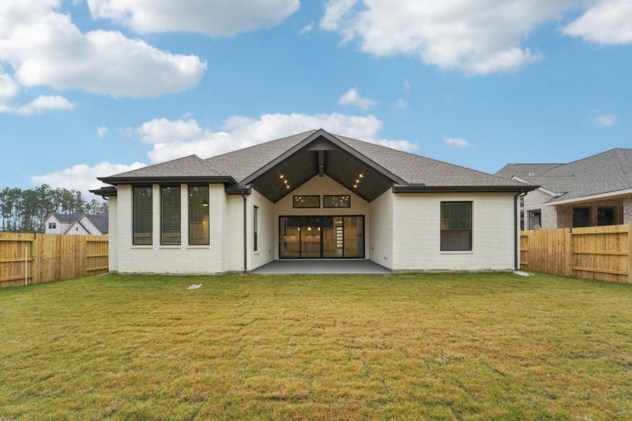 Exterior details and patio area of a home in Evergreen, Conroe (Image 3).