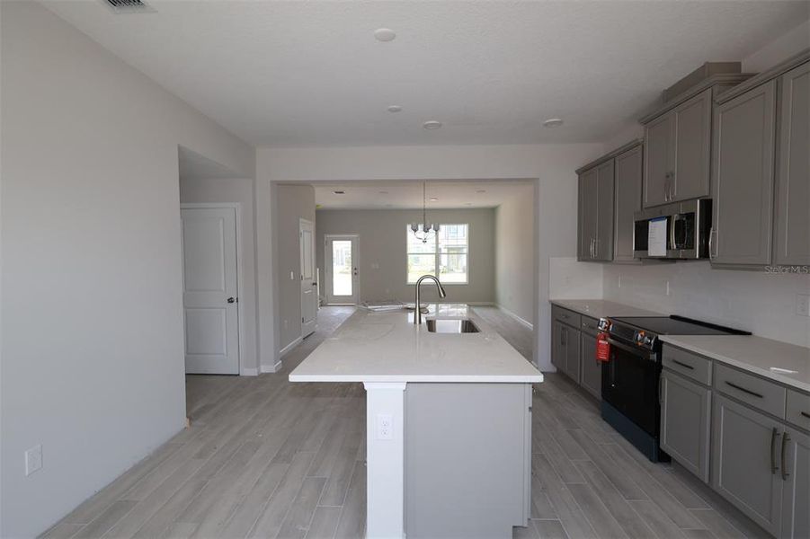 Furnished interior view inside a new home in Center Lake on the Park, St. Cloud (Image 7).