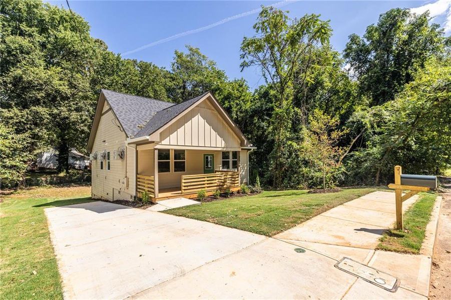 Front exterior of a new home in , Atlanta, GA, highlighting curb appeal (Image 22).