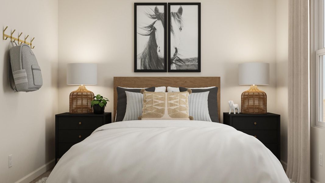 A bedroom with a bed and lamps.