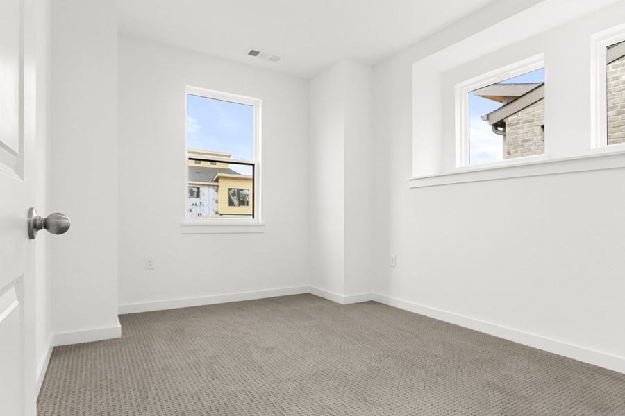 Spacious, unfurnished interior of a new home in Willow Grove Townhomes, Melissa (Image 13).