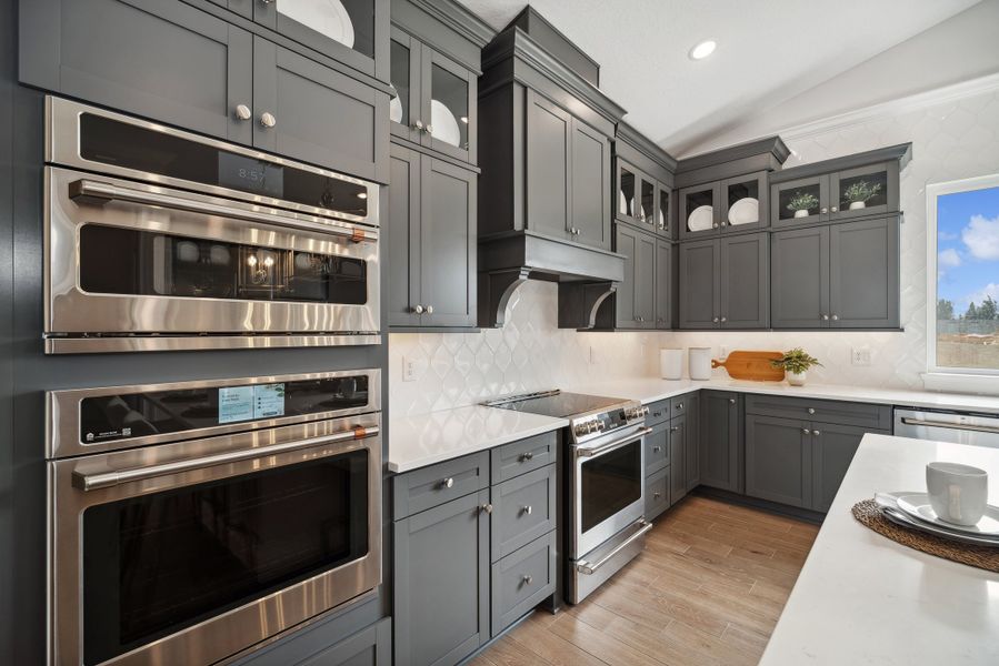 Kitchen with white tile backsplash