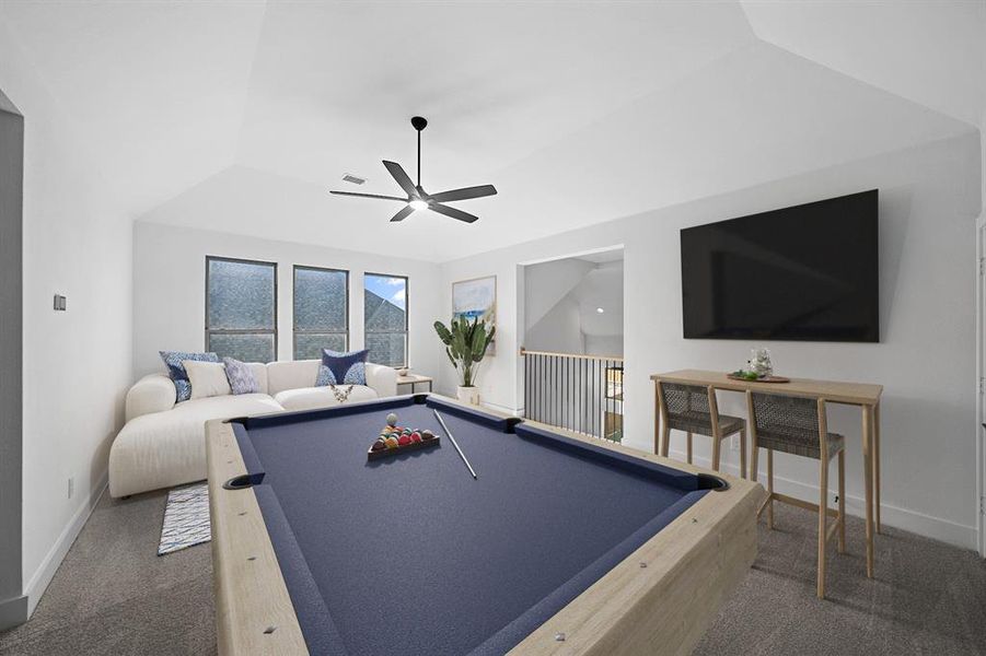 Rec room with dark carpet and a ceiling fan