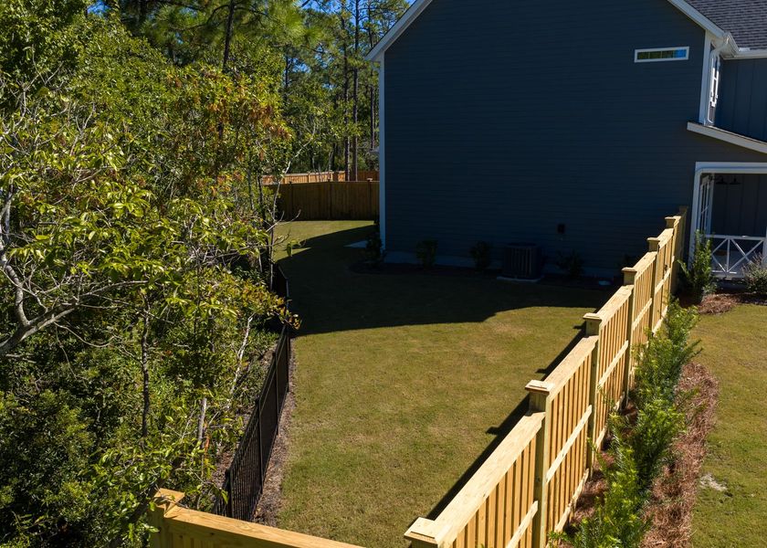Exterior details and patio area of a home in Carolina Creek, Hampstead (Image 23).