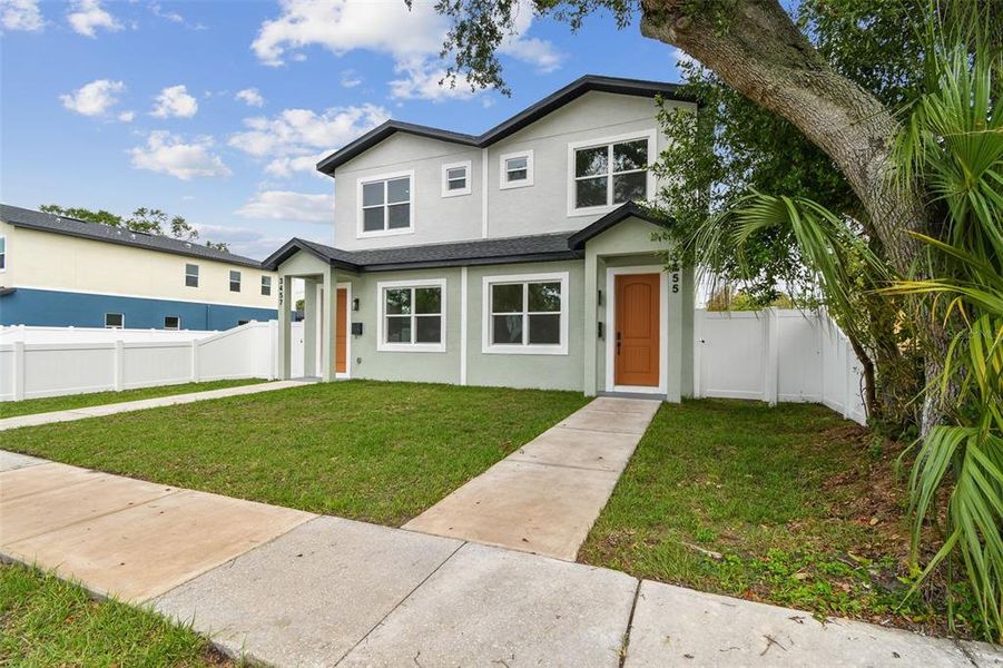 Front exterior of a new home in , St. Petersburg, FL, highlighting curb appeal (Image 2). Front exterior of a new home in , St. Petersburg, FL, highlighting curb appeal (Image 2).