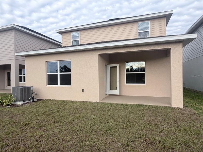 Exterior details and patio area of a home in Harmony Central, St. Cloud (Image 13).