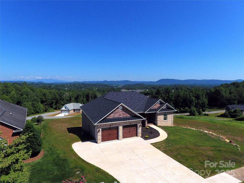 Front exterior of a new home in , Lenoir, NC, highlighting curb appeal (Image 23).