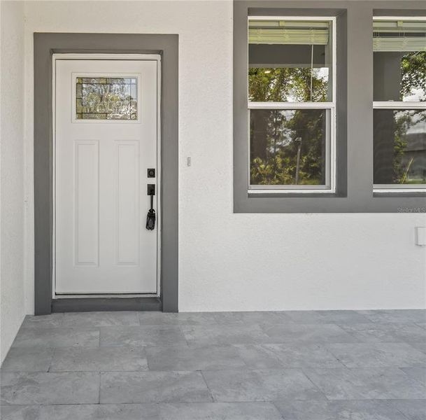 Exterior details and patio area of a home in , Sebring (Image 3).