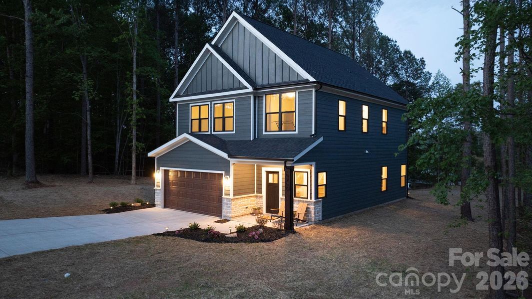 Front exterior of a new home in , Hickory, NC, highlighting curb appeal (Image 29).