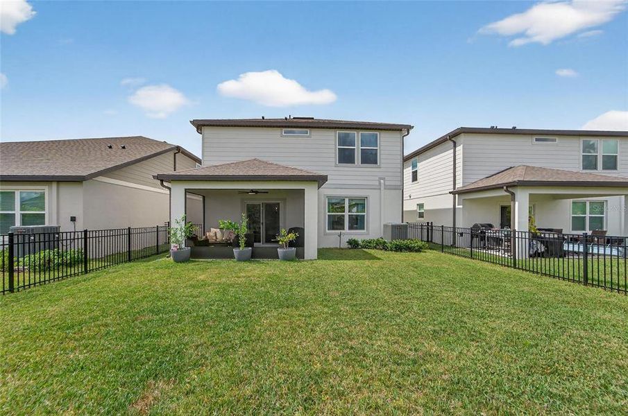 Exterior details and patio area of a home in Waterset, Apollo Beach (Image 2).