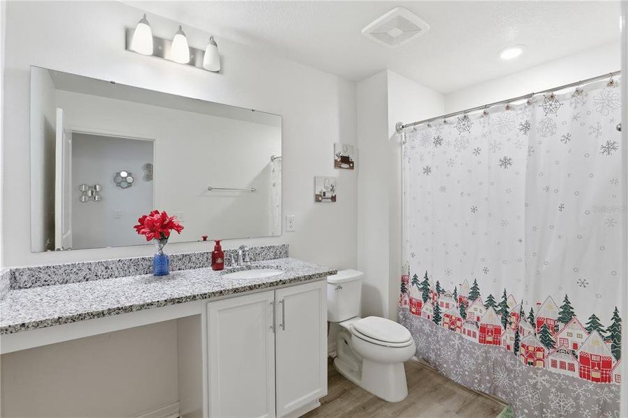 Furnished interior view inside a new home in Bellaviva I at Westside, Davenport (Image 9).