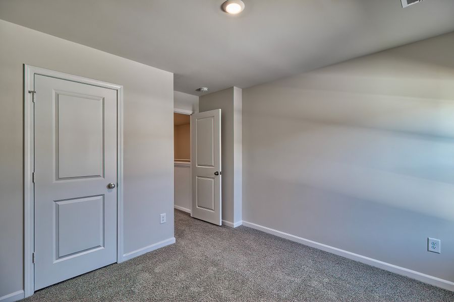 Representative unfurnished interior of a home built from the Cypress by McGuinn Homes in Hidden Hills, Laurens (Image 24). Representative unfurnished interior of a home built from the Cypress by McGuinn Homes in Hidden Hills, Laurens (Image 24).