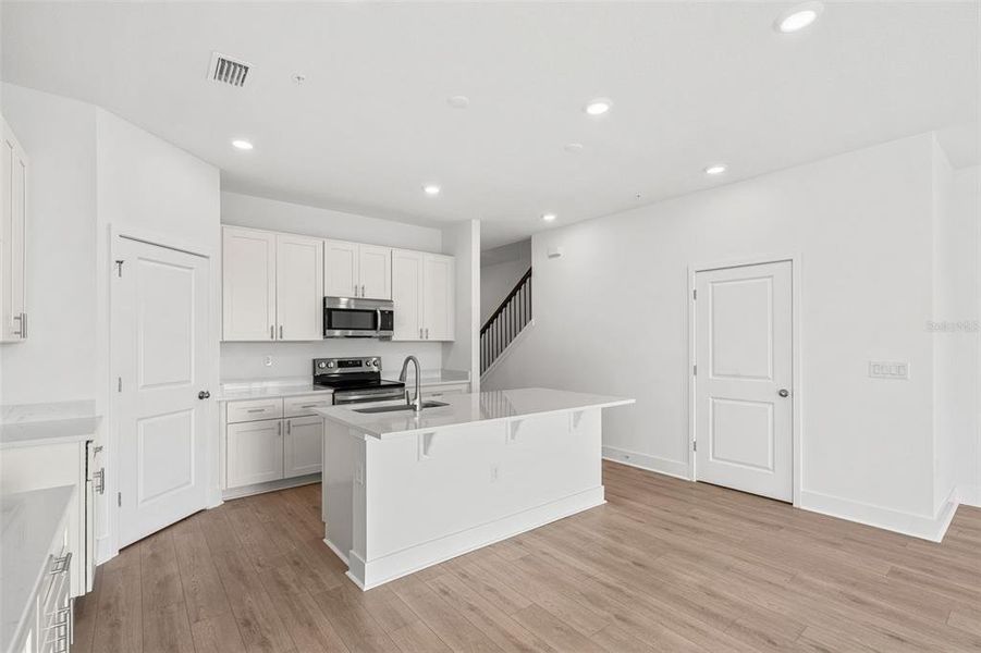 Furnished interior view inside a new home in Magnolia Reserve, Ocoee (Image 6). Furnished interior view inside a new home in Magnolia Reserve, Ocoee (Image 6).