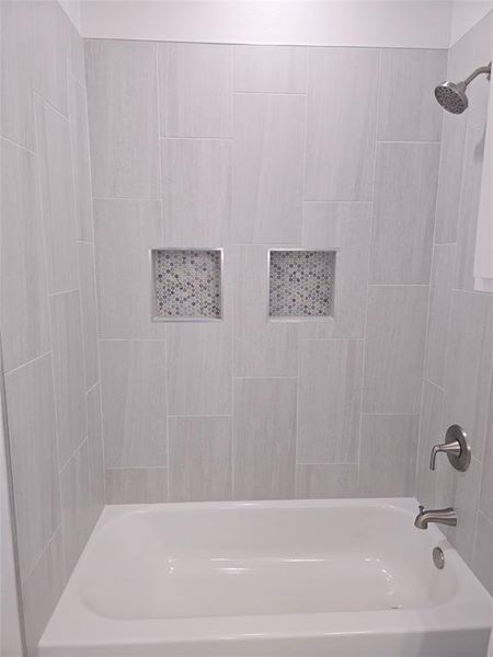 Bathroom featuring shower / tub combination Bathroom featuring shower / tub combination