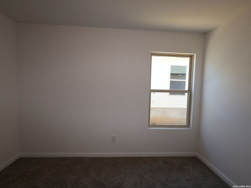 Spacious, unfurnished interior of a new home in Hunters Ranch, San Antonio (Image 25).