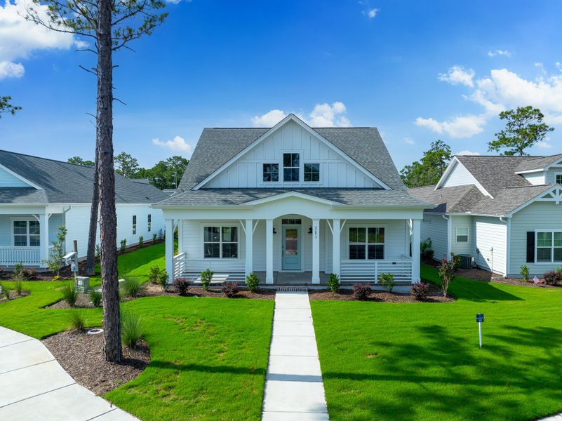 Front exterior of a new home in Osprey Landing, Southport, NC, highlighting curb appeal (Image 26).