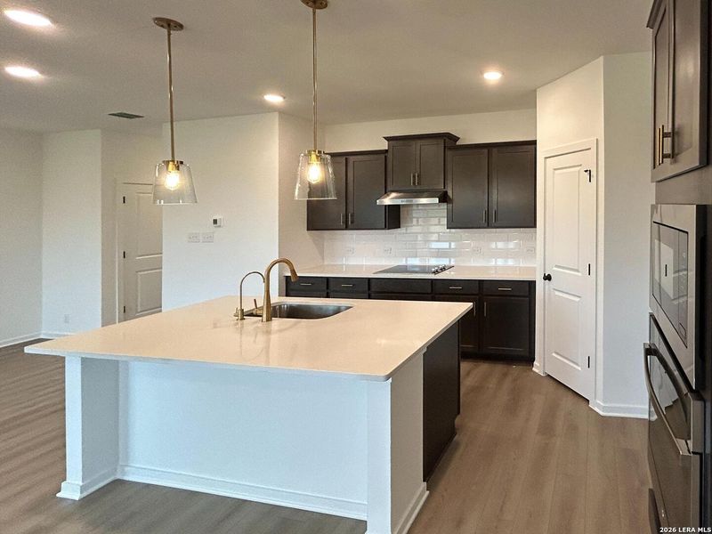 Furnished interior view inside a new home in Hennersby Hollow, San Antonio (Image 12).