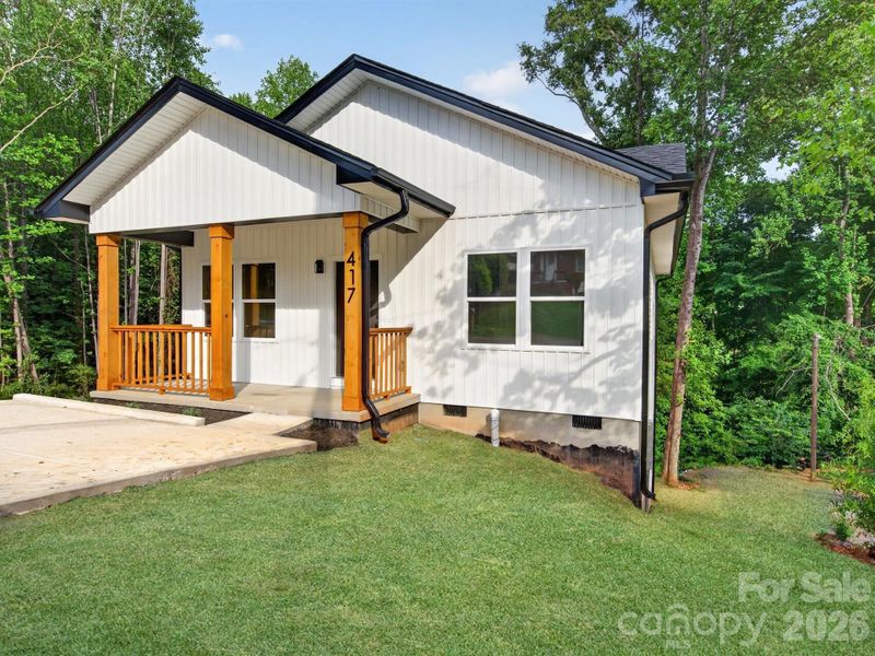 Exterior details and patio area of a home in , Hickory (Image 34).