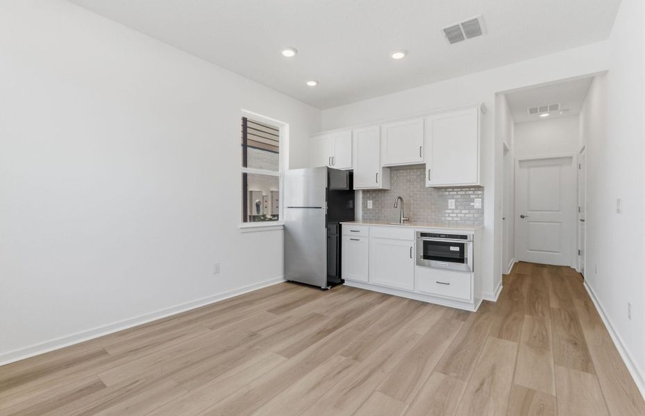 Furnished interior view inside a new home in Vida's Way, Wesley Chapel (Image 12).